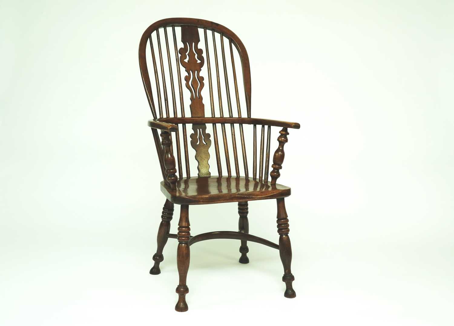 Lot 462 - A Victorian yew and elm Windsor chair