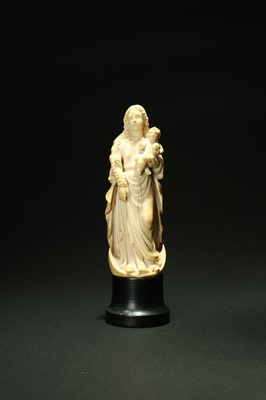 Lot 457 - A French carved ivory figure of the Madonna and child, 19th century