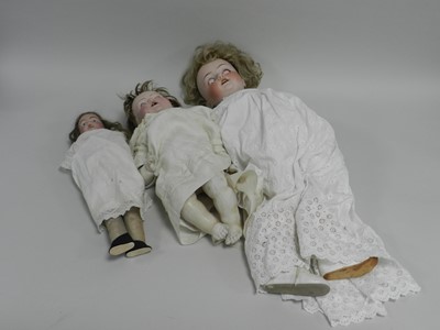 Lot 361 - Two German porcelain headed dolls, the first...