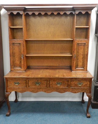 Lot 408 - A mid-20th century walnut veneered dresser and...