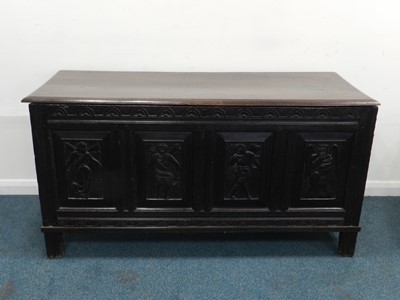 Lot 495 - A carved oak quadruple panel coffer, 17th/18th...