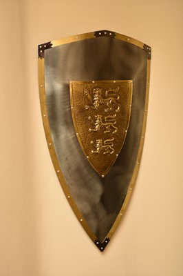 Lot 208 - A reproduction painted wood armorial shield,...