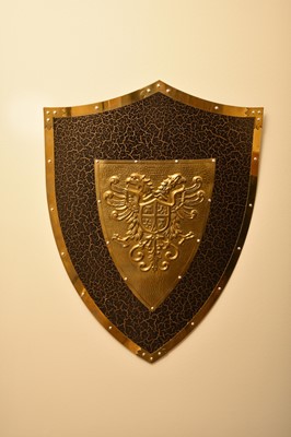 Lot 208 - A reproduction painted wood armorial shield,...