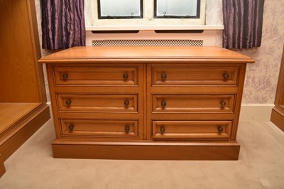 Lot 218 - A Clive Christian light oak chest of six short...