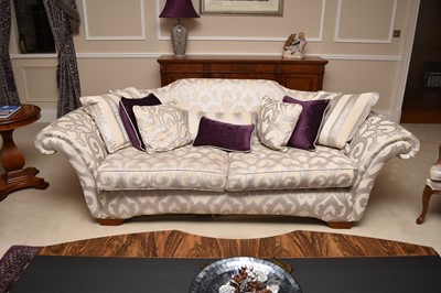 Lot 224 - A contemporary scroll-arm three-seater size...