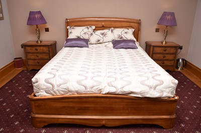 Lot 364 - A reproduction walnut bed, the sleigh-type...
