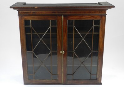 Lot 420 - An inlaid mahogany glazed bookcase top, the...