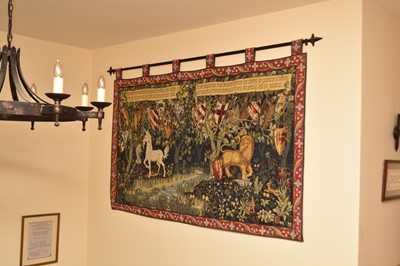 Lot 249 - A machine-woven tapestry wall hanging, worked...