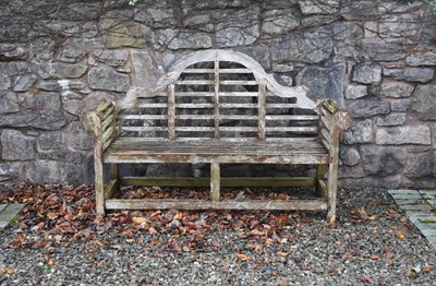 Lot 265 - A Chatsworth type teak slatted garden bench....