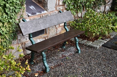 Lot 267 - Two painted cast iron and plank-slatted rustic...