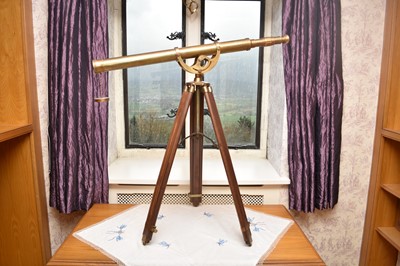 Lot 270 - A reproduction brass telescope, with brass and...