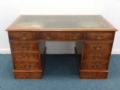 Lot 426 - A reproduction walnut pedestal desk, the...