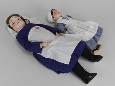 Lot 350 - Two German porcelain-headed dolls in nurse...