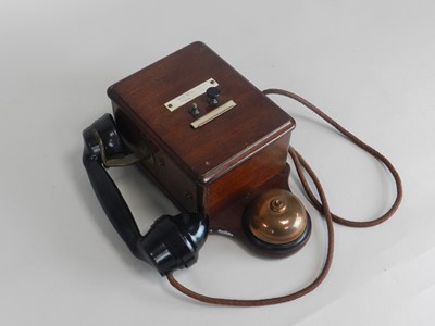 Lot 334 - A wall-mounted mahogany-cased telephone, with...