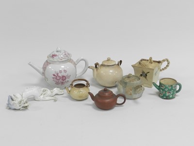 Lot 279 - A group of Chinese and Japanese teapots and a...