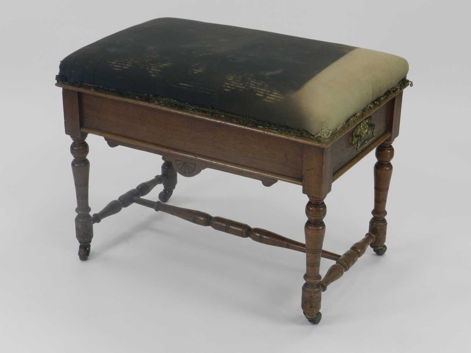 Lot 522 - An Edwardian oak piano stool, with upholstered...