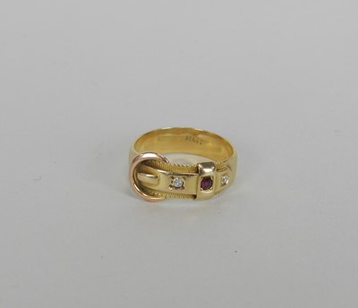 Lot 41 - A ruby and diamond buckle ring
