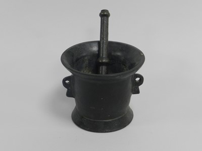 Lot 341 - An 18th-century style bronze pestle and mortar,...