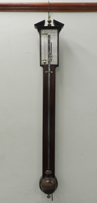 Lot 376 - A George III mahogany stick barometer, the...