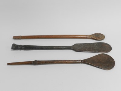 Lot 393 - Three Oceanic tribal carved wood ceremonial...