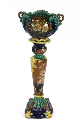 Lot 233 - A Continental majolica jardiniere on stand...