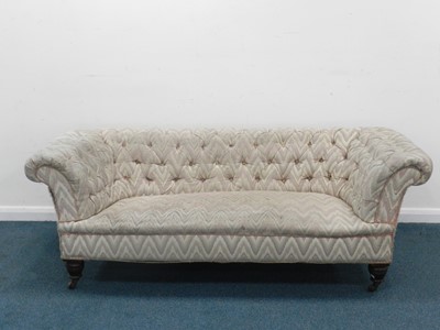 Lot 440 - An upholstered Chesterfield sofa, of typical...