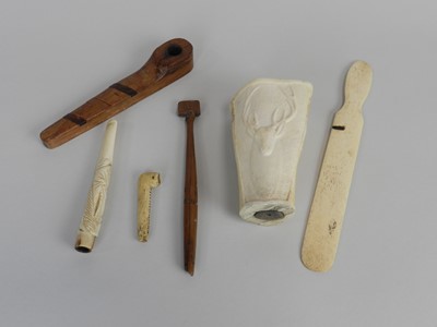 Lot 263 - A group of treen and bone carvings, probably...