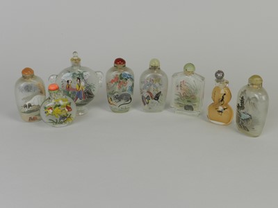 Lot 287 - Eight Chinese glass painted snuff bottles,...