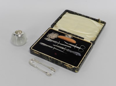 Lot 14 - A cased silver mounted manicure set