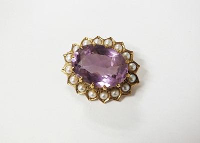 Lot 74 - A 9ct gold amethyst and split seed pearl brooch