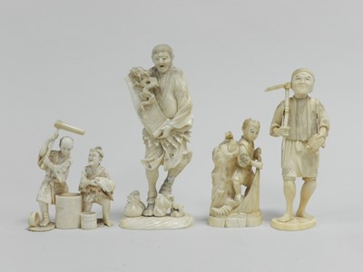 Lot 305 - A Meiji Period carved ivory okimono