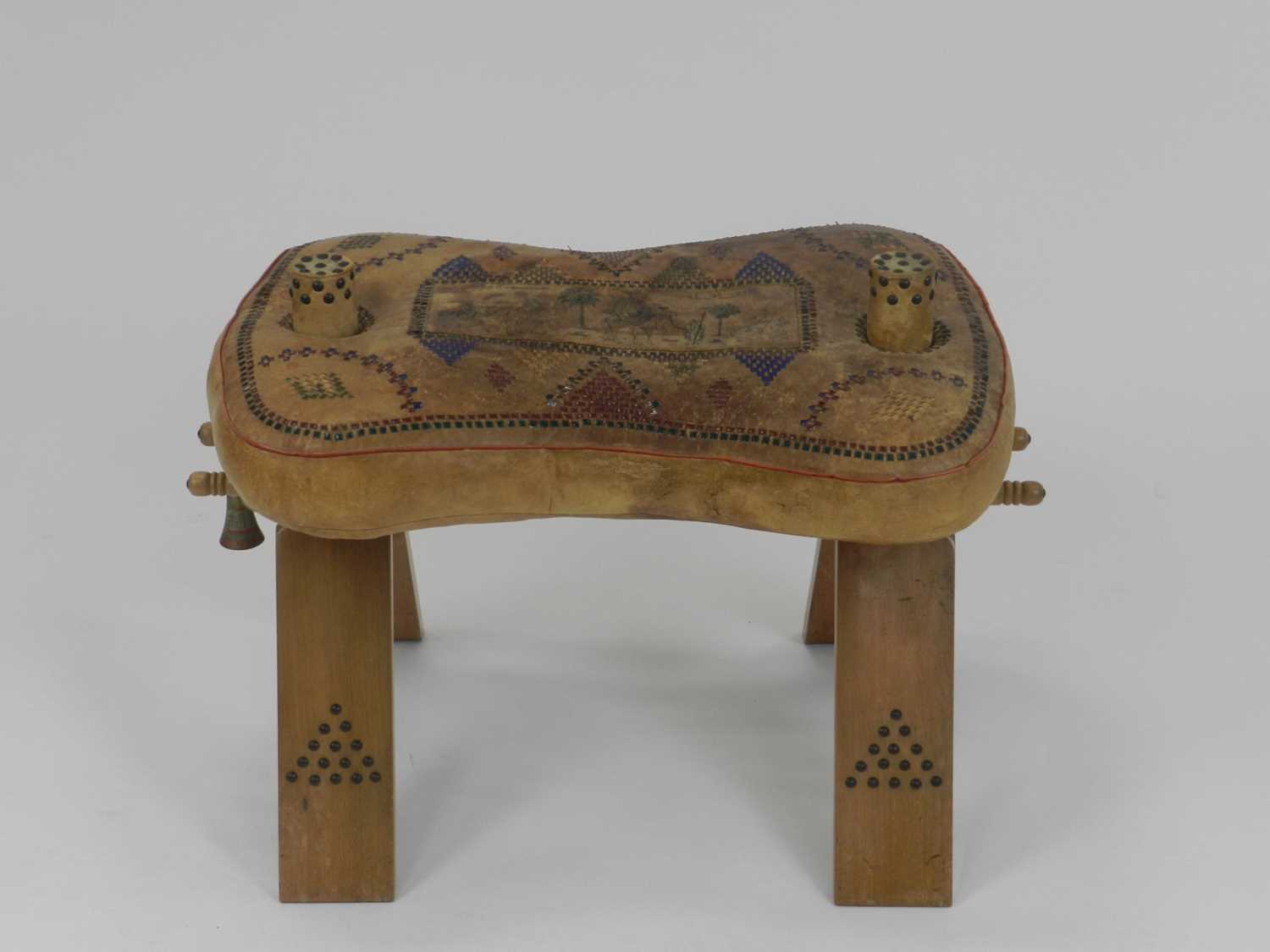 Lot 449 - A vintage leather and wood camel saddle,...