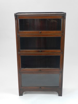 Lot 453 - An Edwardian four-tier glazed bookcase, 72cm...