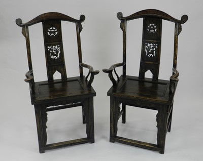 Lot 193 - A pair of Chinese softwood armchairs, 20th...