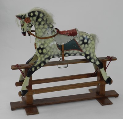 Lot 347 - A British painted wood rocking horse, in...