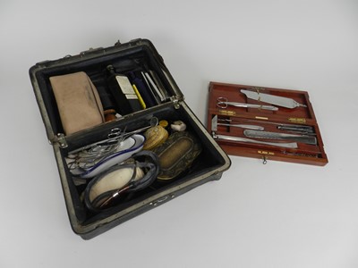 Lot 387 - A mahogany-cased field surgery kit, first half...