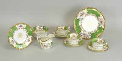 Lot 242 - A Coalport green batwing tea service