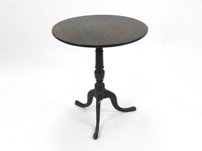 Lot 483 - An 18th/19th century oak, tilt-top, tripod table