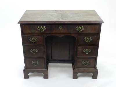 Lot 494 - A George III mahogany kneehole dressing chest