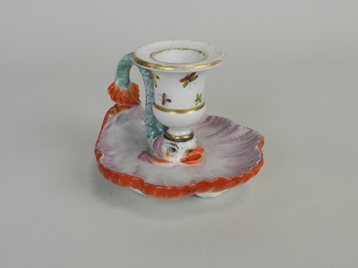 Lot 393 - A Continental porcelain chamberstick, probably...