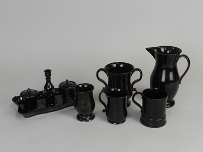 Lot 400 - A good collection of black-glazed Jackfield...