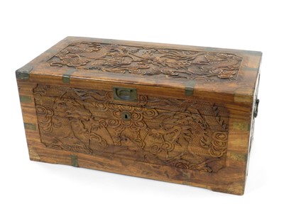 Lot 484 - A 20th century Chinese carved camphorwood chest