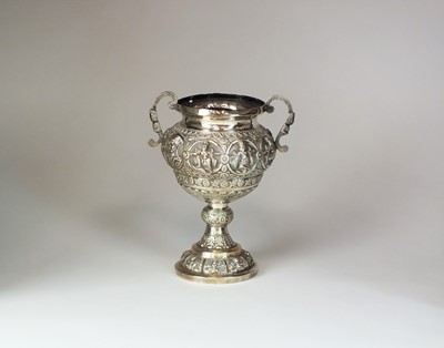 Lot 10 - A 19th century Indian white metal twin handled urn