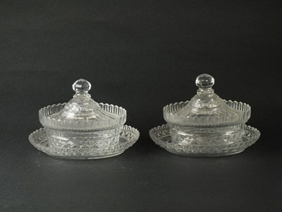 Lot 214 - A pair of George III Irish oval cut glass butter dishes