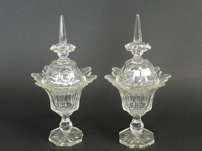 Lot 411 - A pair of Victorian lead crystal sweetmeat dishes and covers