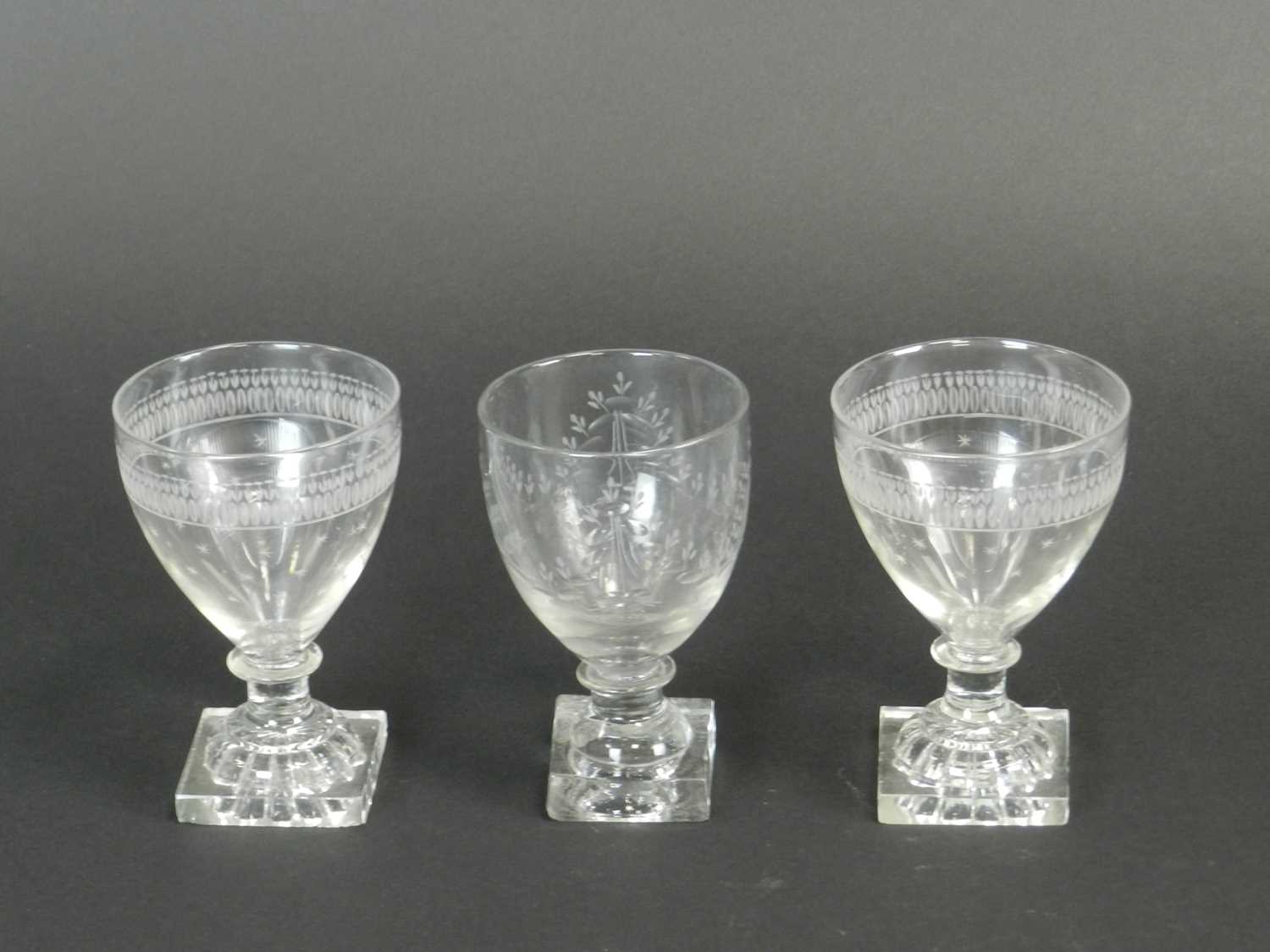 Lot 413 - Three early 19th century English glass rummers