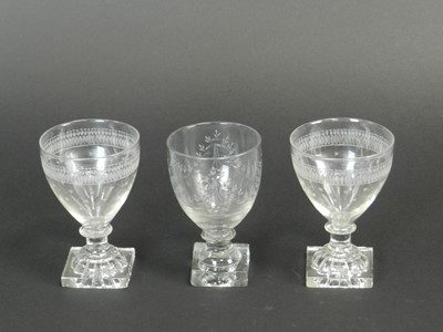 Lot 413 - Three early 19th century English glass rummers