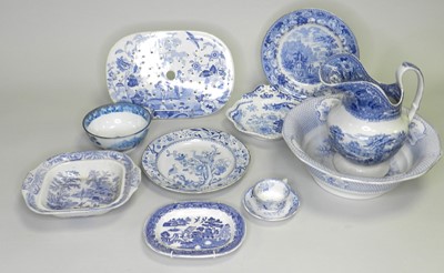 Lot 156 - A large collection of British blue and white pottery