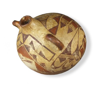 Lot 252 - A Native American Hopi polychrome canteen