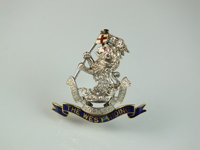 Lot 42 - A diamond and enamel regimental brooch